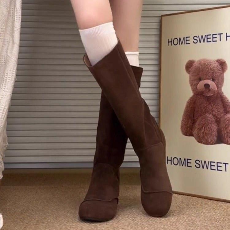 Huge good-looking huge versatile inner heightening suede pile high boots women's 2025 autumn and winter retro flat boots boots