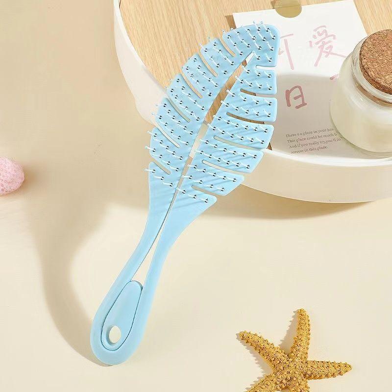 

Viral Leaf-shaped Volumizing Cushion Comb, Portable Massage Rib Comb for Women, Detangles Hair, Creates Fluffy Hairstyle, Ideal