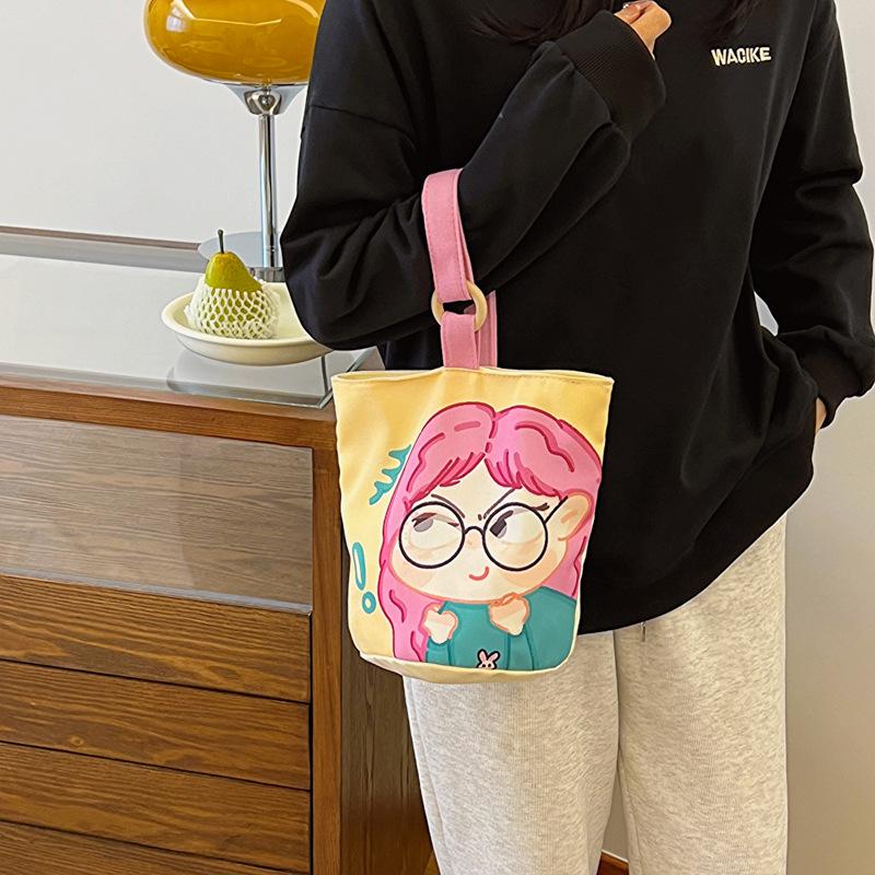 Neue Eimer-Cartoon-Graffiti-Handtasche Mode Nische Ein-Schulter Modische Damenhandtasche Ins Vielseitige Umhängetasche