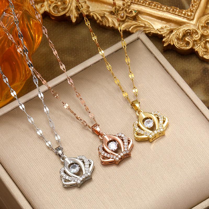 Lively Crown Titanium Necklace: Elegant Zirconia Pendant for Women's Distinctive Style.