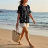 Women’s Casual Printed Henley Button Neck Short Sleeve Cotton Linen Shirt with Chest Pocket and Relaxed Fit for Everyday Wear