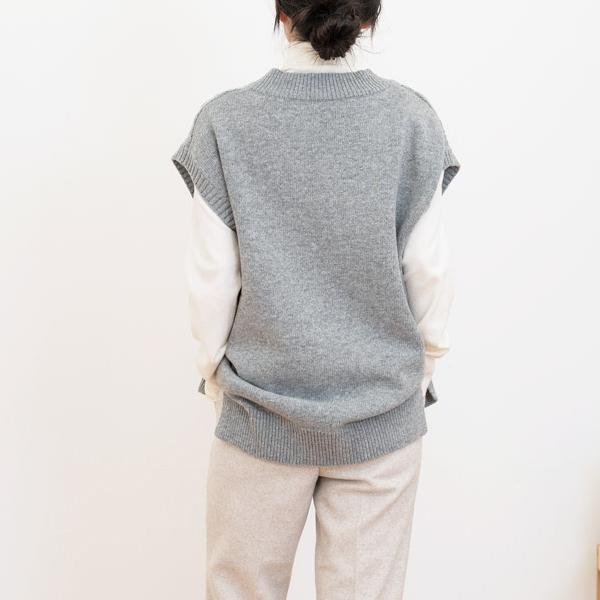 Vestă pentru femei decolteu în V linie model răsucire peste vesta potrivită aspect casual pentru întâlnire în Coreea de modă