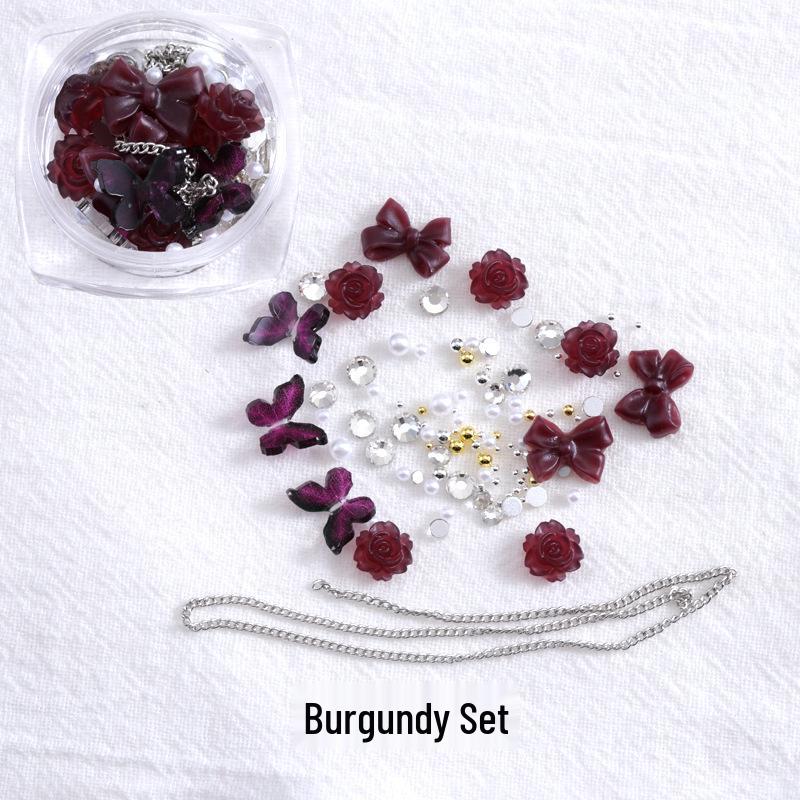 

Трендовый набор для нейл-арта «Джем из копченой сливы» с аксессуарами «Бабочка», «Камелия», «Бант», «Жемчуг», «Тонкая цепочка» и «Стразы»