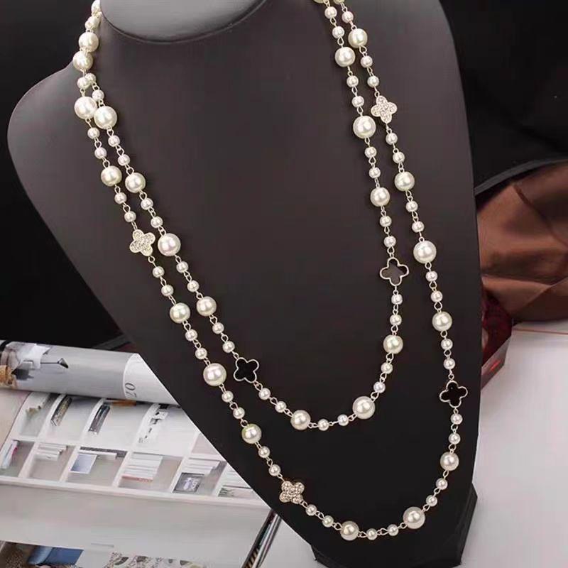 Elegant Pearl Four-Leaf Clover Women's Necklace - Versatile Layered Sweater Chain for Autumn/Winter