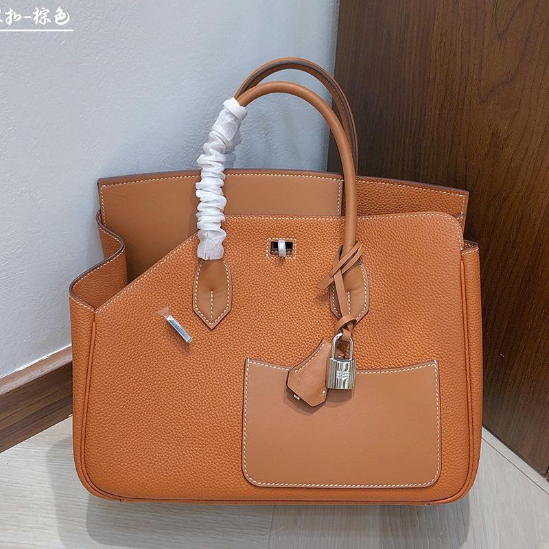 2025 Neuer Stil Reißverschluss Ledertasche 30cm Doppelseitig Unregelmäßig Echtes Leder Damenhandtasche High-End Handgefühl Henkeltasche