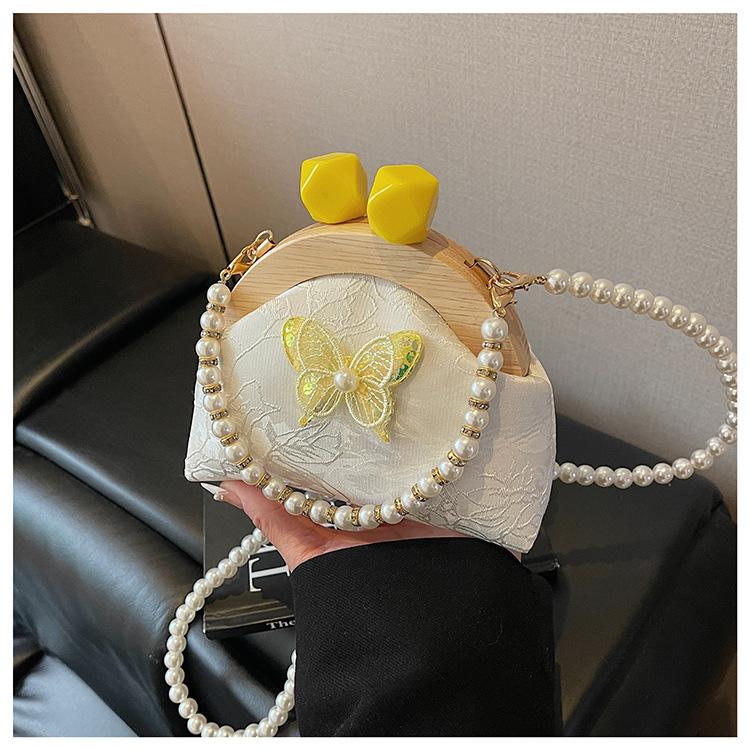 Summer embroidery small bag women's new fashion bamboo joint portable mouth gold bag pearl chain messenger bag