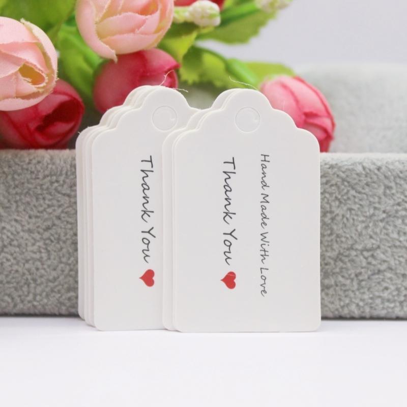 100 szt. + 100 sznurków 3x5 cm biały/papier kraft. Dziękujemy za ręczne wykonanie zawieszki do etykiety