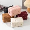 Large Capacity Makeup Organizers with Quilted Bowknot Accent and Multiple Divisions for Efficient Travel