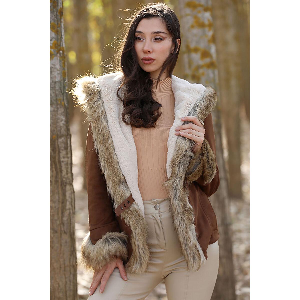 

Женская шуба из камня