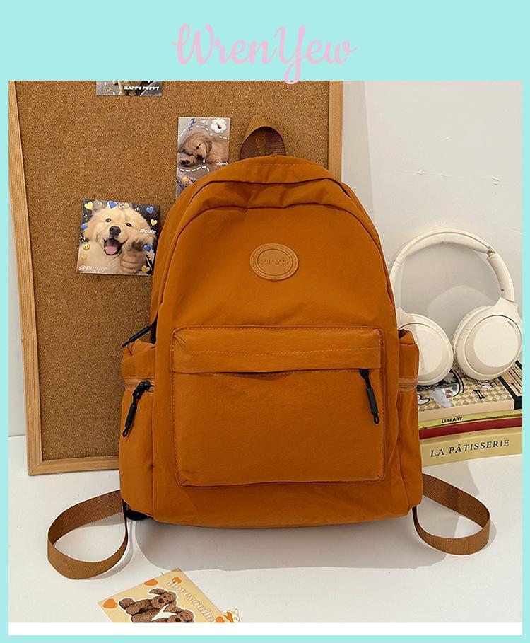 Fashionable Outdoor Ladies Backpack With Alphabet Decoration And Solid Color Design For Commuting
