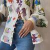 Stylish Graffiti Print Lantern Sleeve Cardigan Shirt with Lapel - European & American Design