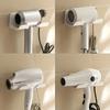 1-Piece Wall-Mounted Hair Dryer Organizer - Sleek White Plastic Corner Holder for Bathrooms and Homes.