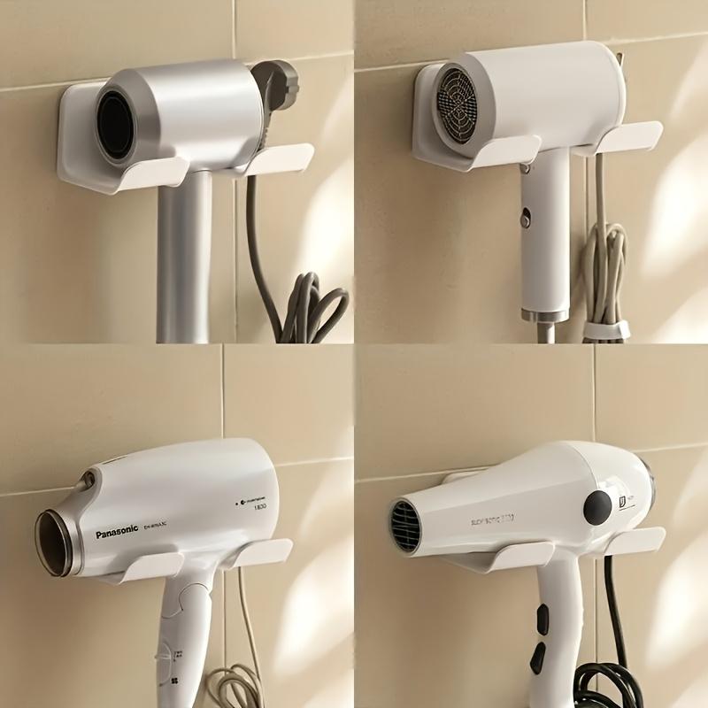 1-Piece Wall-Mounted Hair Dryer Organizer - Sleek White Plastic Corner Holder for Bathrooms and Homes.