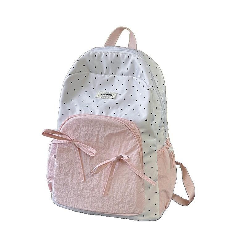 The new schoolbag is high-value, fresh and sweet, candy-colored polka dot bow backpack, junior high school backpack.