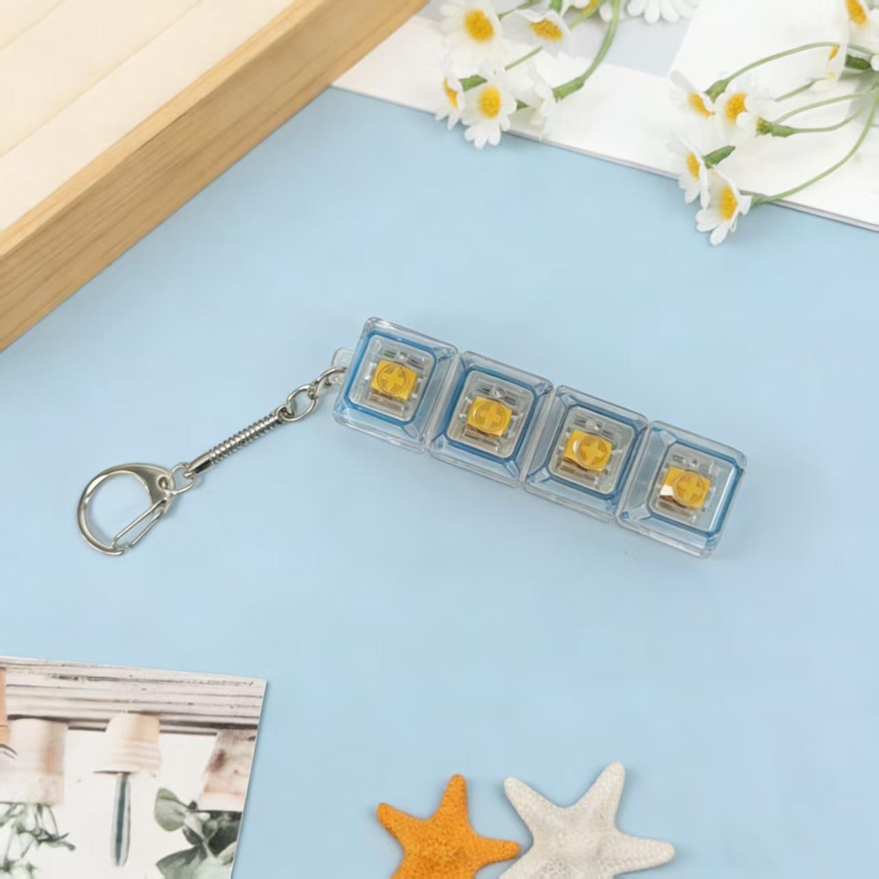 

2026 New LED Keyboard Keychain Fidget Toy Crystal Clicker Light Up Sensory Toy Portable Stress Relief Anti-Anxiety Fidget Gadget