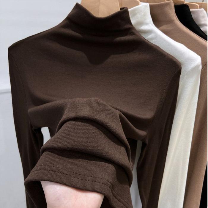 Damski prążkowany top bazowy z półgolfem, z długim rękawem. Modny na wiosnę, jesień i zimę. Dopasowany krój. Top wewnętrzny wykonany z dralonu.