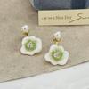 Forest-Inspired Fresh Oil-Drip Flower Pearl Earrings: Elegant, Reversible Design for Women Seeking Unique, Light Luxury and High-End Style.