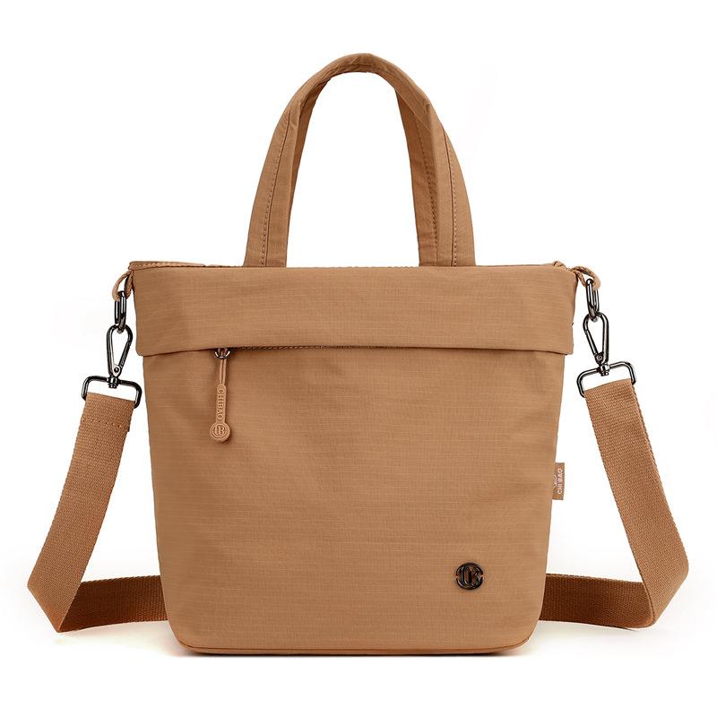 

Large capacity commuter portable bucket bag women s anti-splashing nylon simple shoulder bag portable outdoor leisure messenger bag One Size