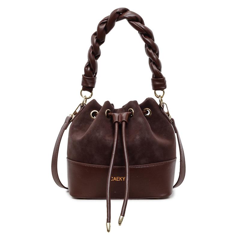 Fashion twist portable bucket bag women's 2025 new retro popular commuter bag contrasting color shoulder messenger bag