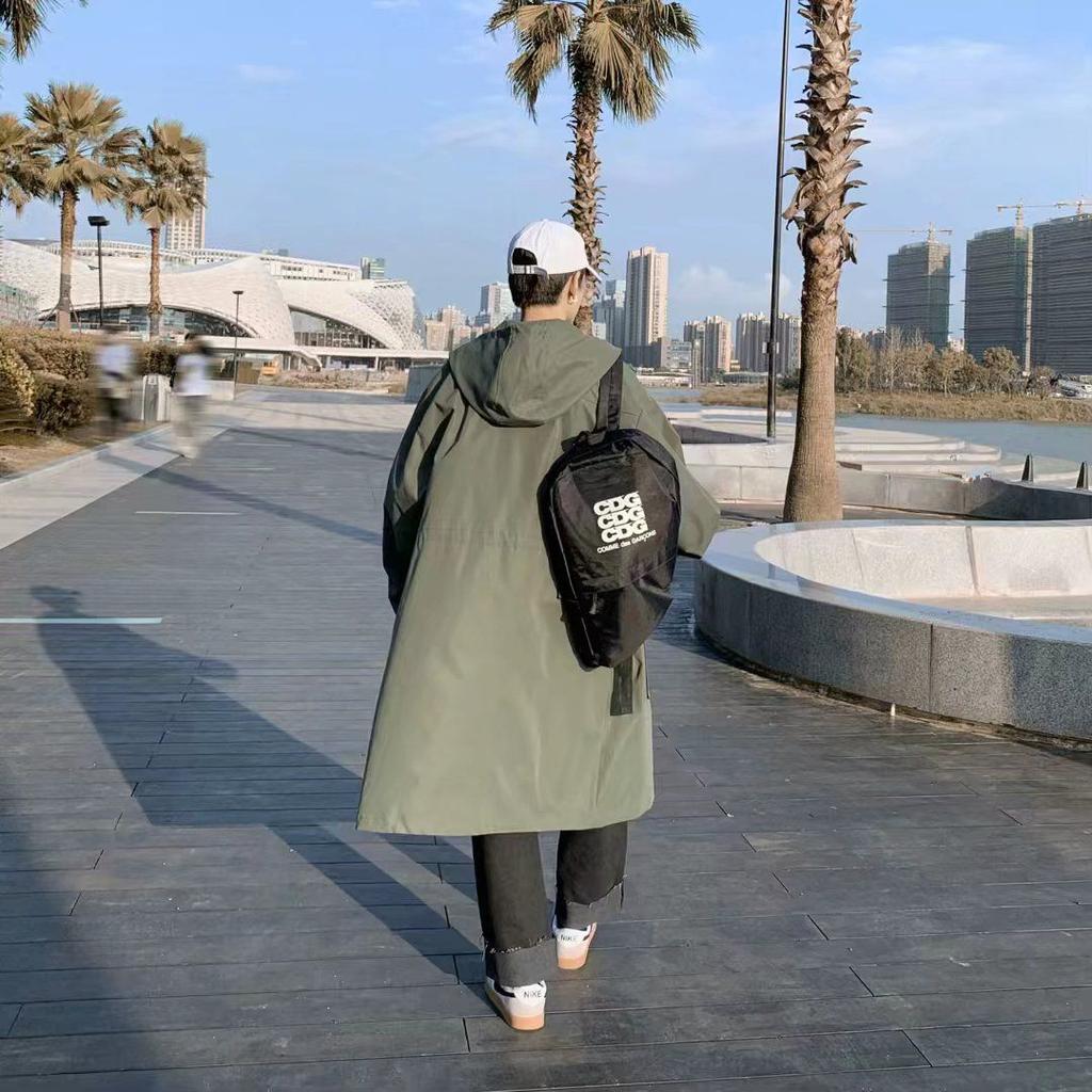 Jarní a podzimní mládežnická větrovka pánská ve stylu Hongkongu středně dlouhá ležérní s kapucí korejská edice trendy pánský kabát