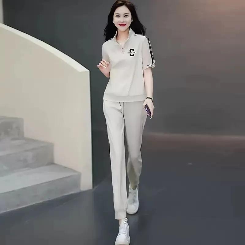 

Модный женский летний спортивный костюм 2025: Омолаживающие брюки на кулиске с манжетами на щиколотках и топ XL абрикосовый