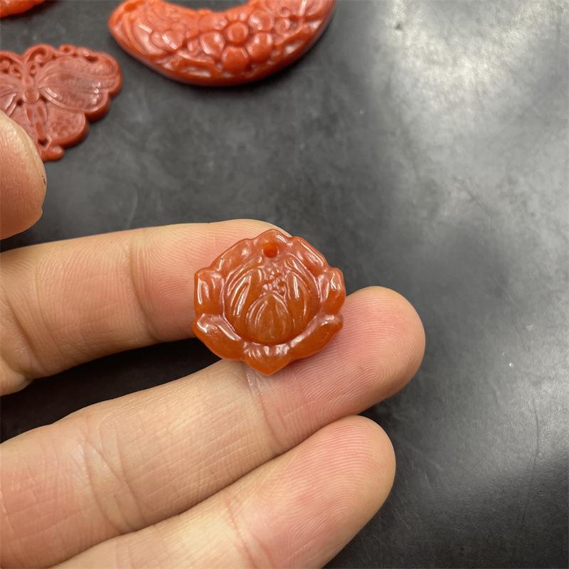 Red Jade Snow Lotus Pendant with Phoenix and Antique Dragon, featuring a Dry Green Ruyi Jade Gourd.