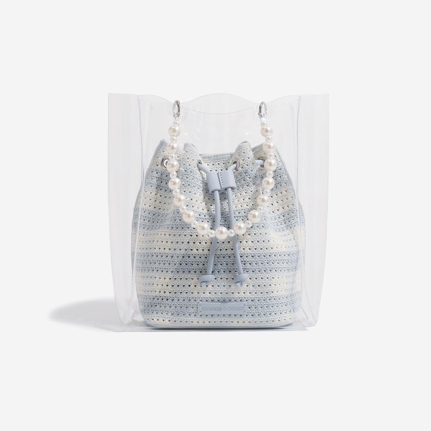 

Knitted Hollow Water Bucket Bag for Women s Spring and Summer New Vacation Beach Backpack, Large Capacity Pearl Hand-held Crossbody Bag світло-синій колір