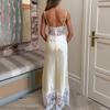 Elegantes Maxikleid mit tiefem V-Ausschnitt, Spitzen-Patchwork, Spaghettiträgern und offenem Rücken