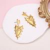 New French retro semi-three-dimensional heart-to-heart pointed peach earrings personality niche simple fashion model