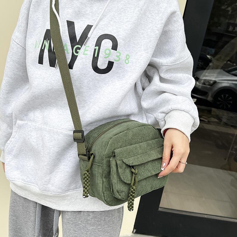 Hot-selling products, striped velvet shoulder messenger bag, corduroy small backpack, men's and women's trendy bags are versatile.