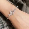 Stainless Steel V-Gold Plated Key Charm Knot Bracelet With Full Rhinestone Embellishment Handcrafted Hollow Design Women