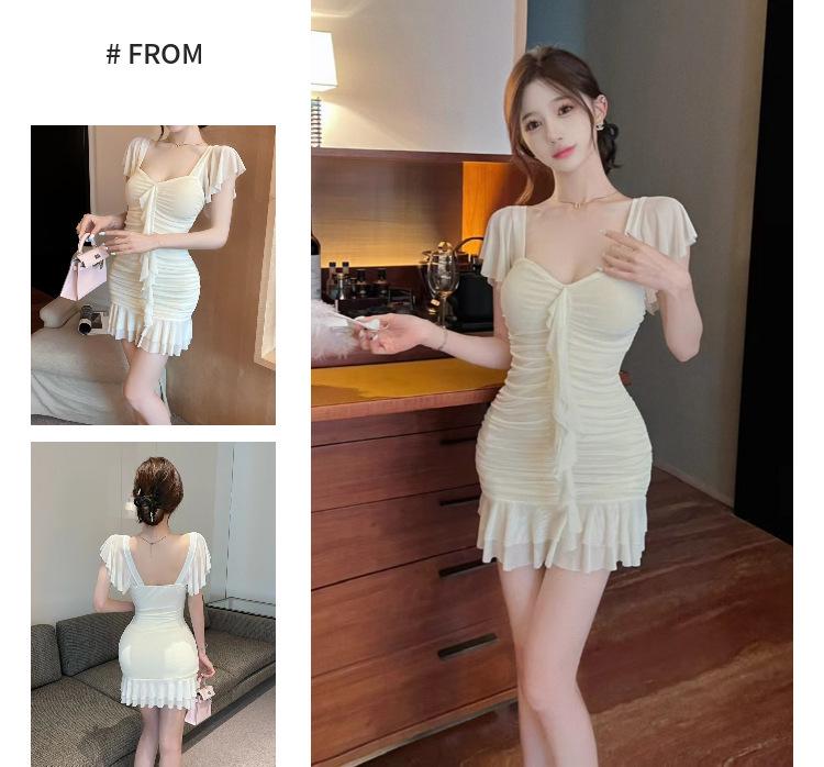 Sexy Hip-Hugging Mesh Splice Fringe Dress – Slim-Fit, Low-Cut Fashion for Bold Style