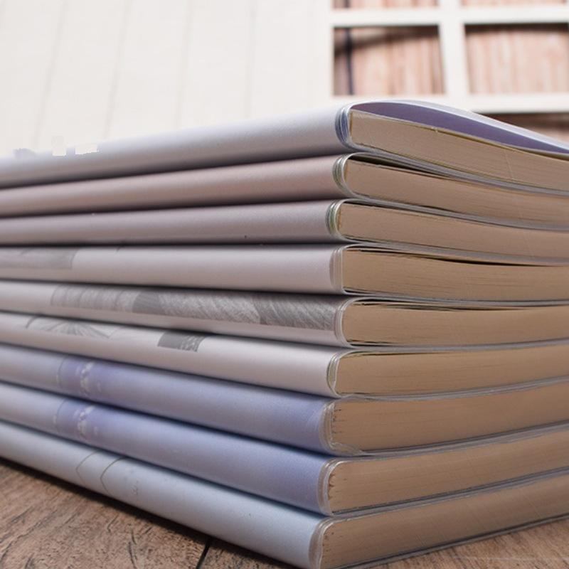 Rubber-Covered A5 Grid & Lined Notebook for Student Use.