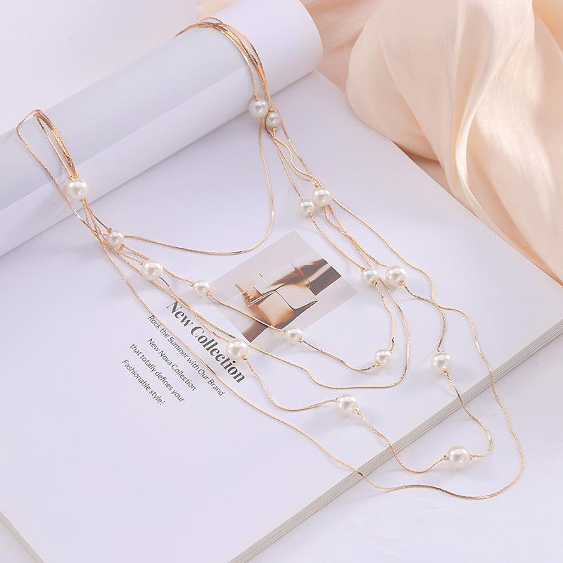 Autumn and winter simple solid color imitation pearl necklace high-end snake bone chain warm color sweater chain women's collarbone chain