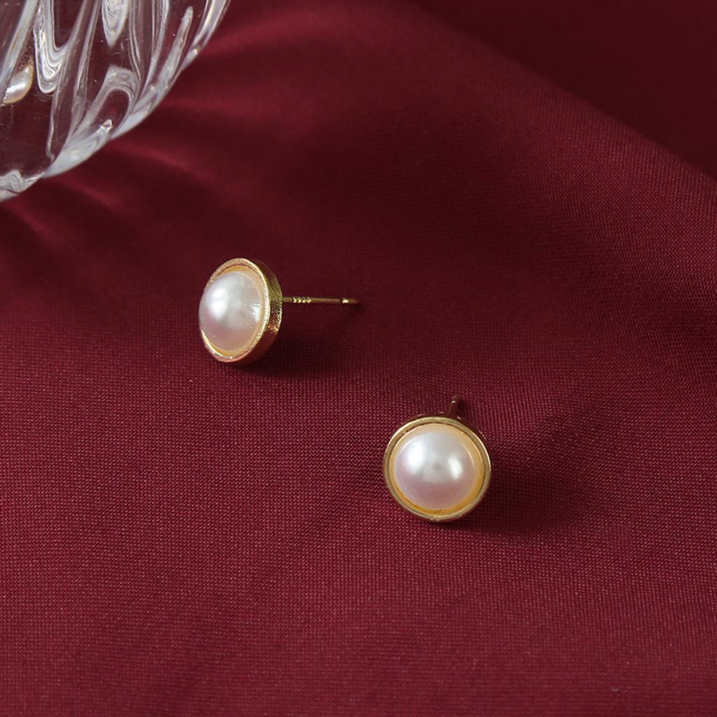 Minimalist Round Pearl Stud Earrings with Metal Frame Simple Small Size Lightweight Design Suitable for Daily Wear and Special Occasions