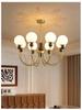 Mid-Century Magic Bean Solid Wood Chandelier: French Retro Light for Living Room or Bedroom.
