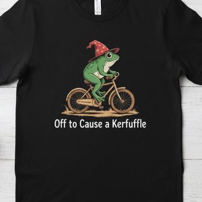 Witch Frog On Bicycle T Shirt, Off To Cause A Kerfuffle Tee, Funny Frog Graphic Tshirt, Cottagecore Frog Top, Whimsical Dark Humor Gift