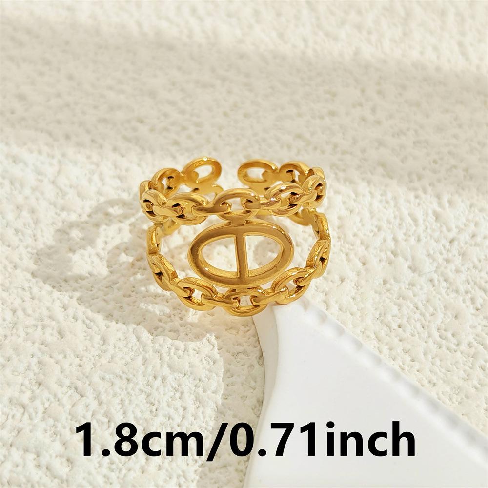 Stainless Steel Hollow Ring - European & American Cold Style Niche Design Light Luxury Women's Fashion