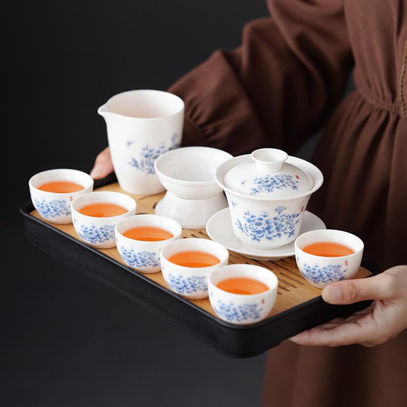 Retro household ceramics new Chinese kung fu tea set Dehua suet jade peony white porcelain high-end gift box