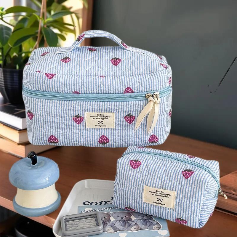 Zippered Cosmetic Pouch for Women, Portable Makeup Organizer in Unique Pink Strawberry Design, Travel-Ready Handbag