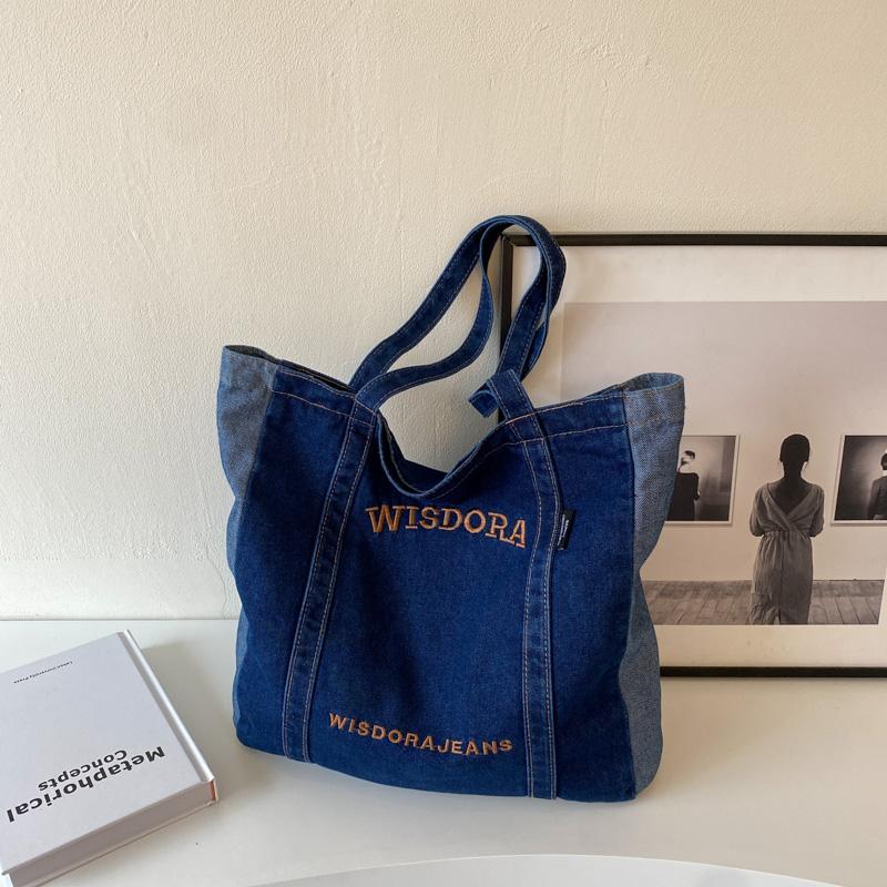 

Large Capacity Denim Handbag Women 2026 New Casual Versatile Letter Embroidery Single Shoulder Bag College Commuting Tote Bag (30cm<Max Length<50cm) темно-синього кольору