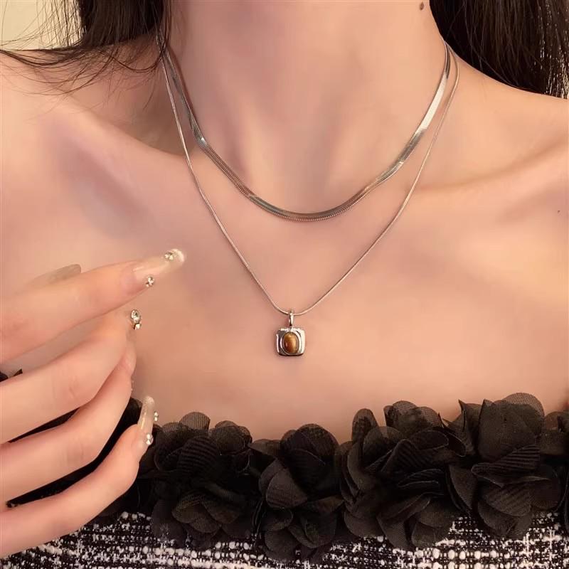 2025 Herbst/Winter Retro Mode Melaid Tigerauge Halskette für Damen - Hoodie-Kette im Hongkong-Stil.