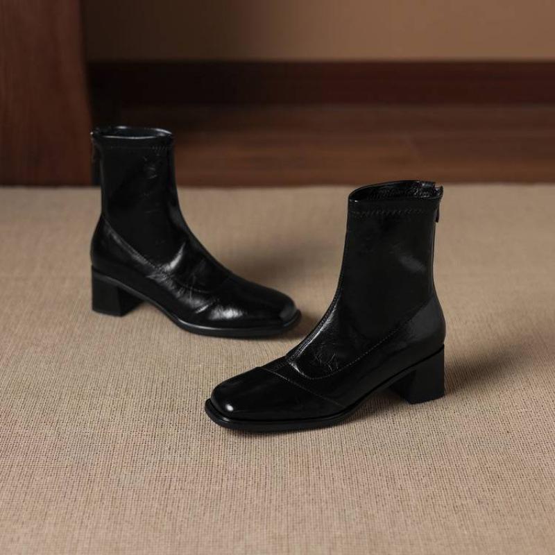 

Autumn and winter Korean leather comfortable Martin boots rear zipper solid color women s large size leather boots high heel round head medium boots 39