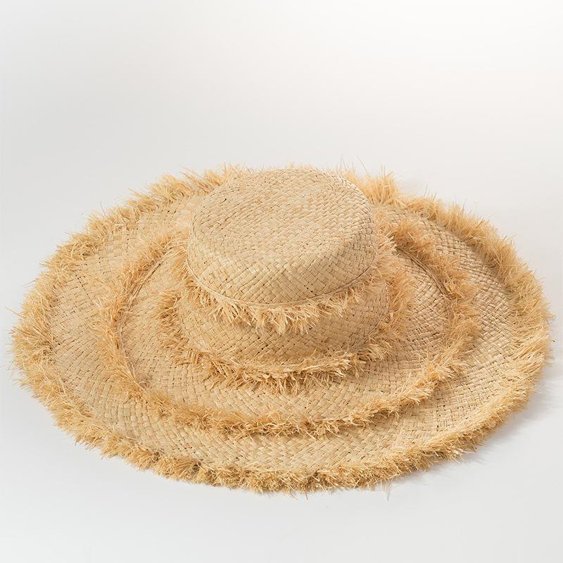 European and American style straw woven fringed decorative hand woven big eaves flat top Lafite straw hat sunscreen sunshade beach burr straw hat