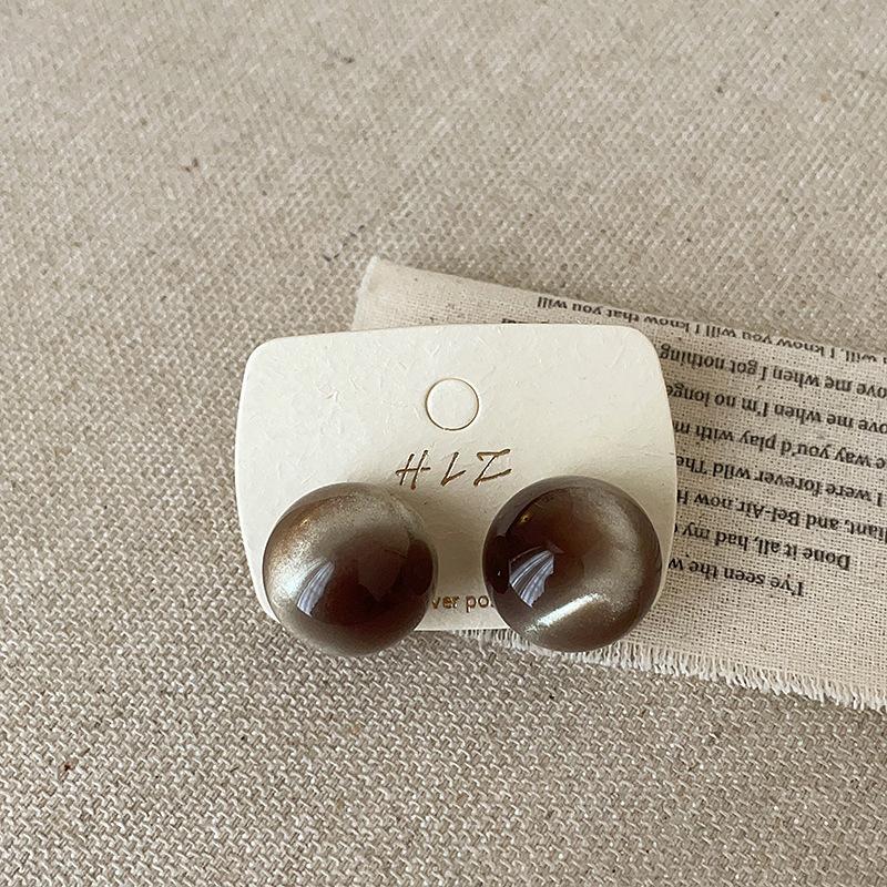 Unique Design Sense Resin Smudged Cat Eye Stud Earrings Women'S Niche Personality Fashion Commuter Versatile Earrings