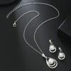 Three-piece set, including a luxurious and elegant minimalist waterdrop design necklace and matching earrings, perfect as a wedding jewelry gift