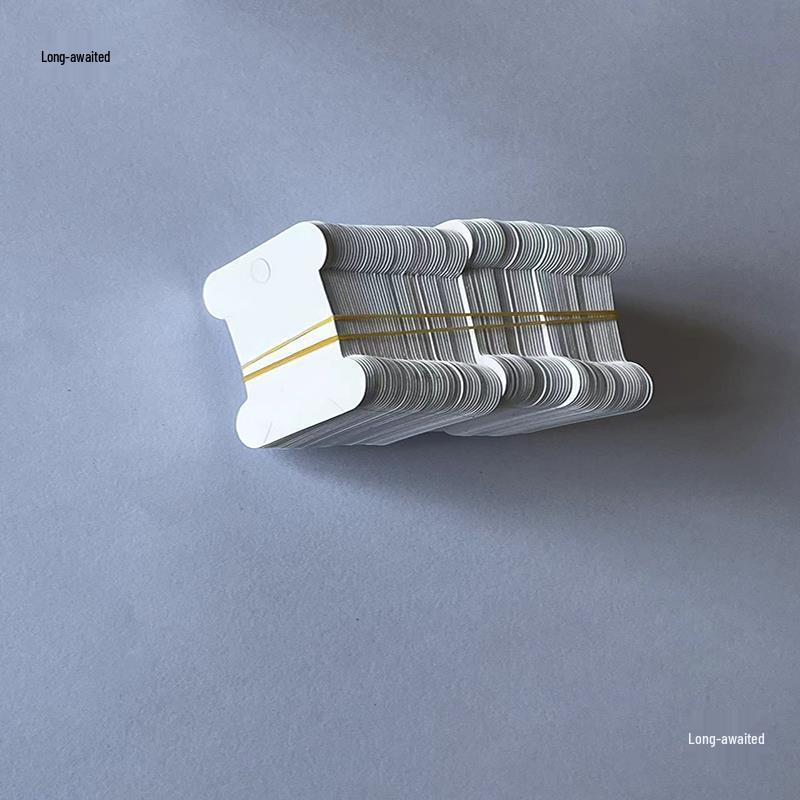 White Paper Thread Bobbins for Cross Stitch Organizing