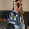 New fashionable large-capacity contrasting color washed denim versatile casual ins wind shoulder portable student commuting bag