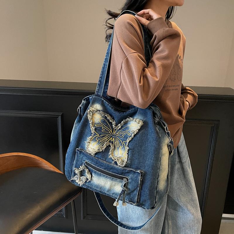 New fashionable large-capacity contrasting color washed denim versatile casual ins wind shoulder portable student commuting bag