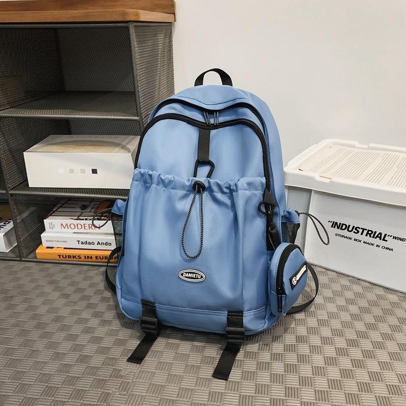 Backpack simple and fashionable college student junior high school student schoolbag female nylon large capacity leisure travel backpack male